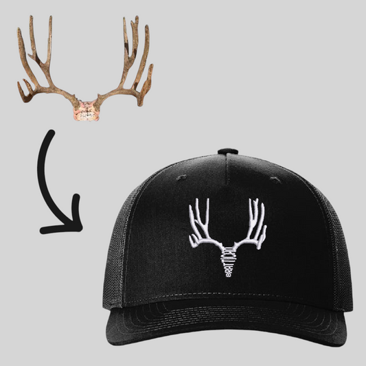 Brattican custom black 5-panel snapback hat featuring white embroidered deer antler trophy design.